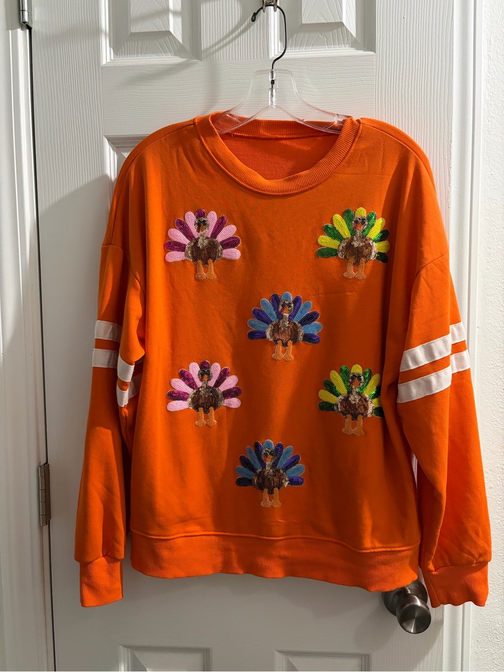 Orange Crewneck Sweatshirt with Colorful Turkey Appliqués